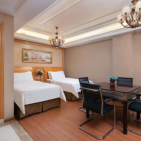 Vienna International Hotel Jiujiang Shili Street Bagian luar foto