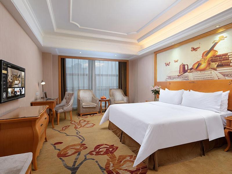 Vienna International Hotel Jiujiang Shili Street Bagian luar foto