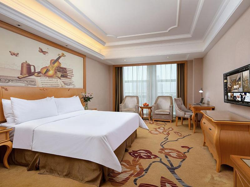 Vienna International Hotel Jiujiang Shili Street Bagian luar foto