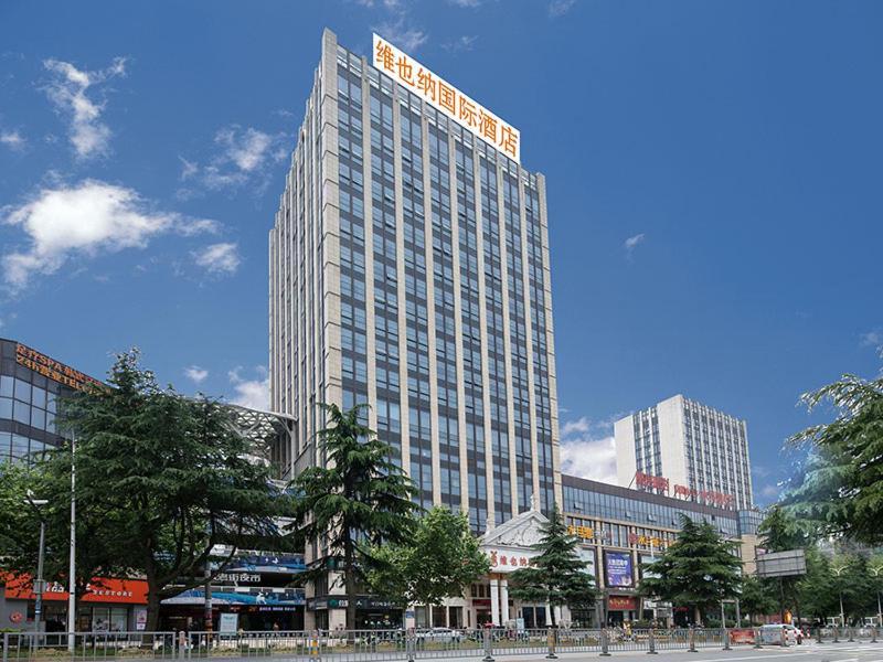 Vienna International Hotel Jiujiang Shili Street Bagian luar foto