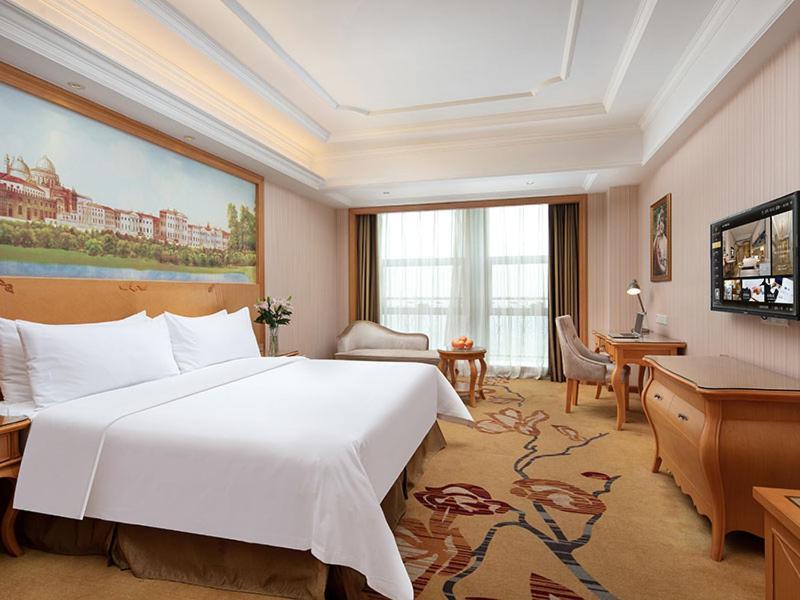 Vienna International Hotel Jiujiang Shili Street Bagian luar foto