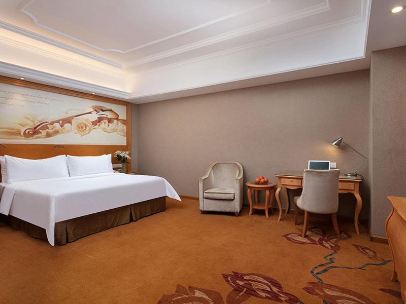 Vienna International Hotel Jiujiang Shili Street Bagian luar foto