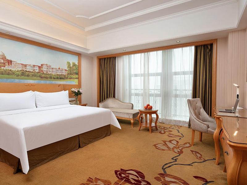 Vienna International Hotel Jiujiang Shili Street Bagian luar foto